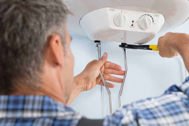 diy-repairing-water-heater-shutterstock-274598660-e1575659263242